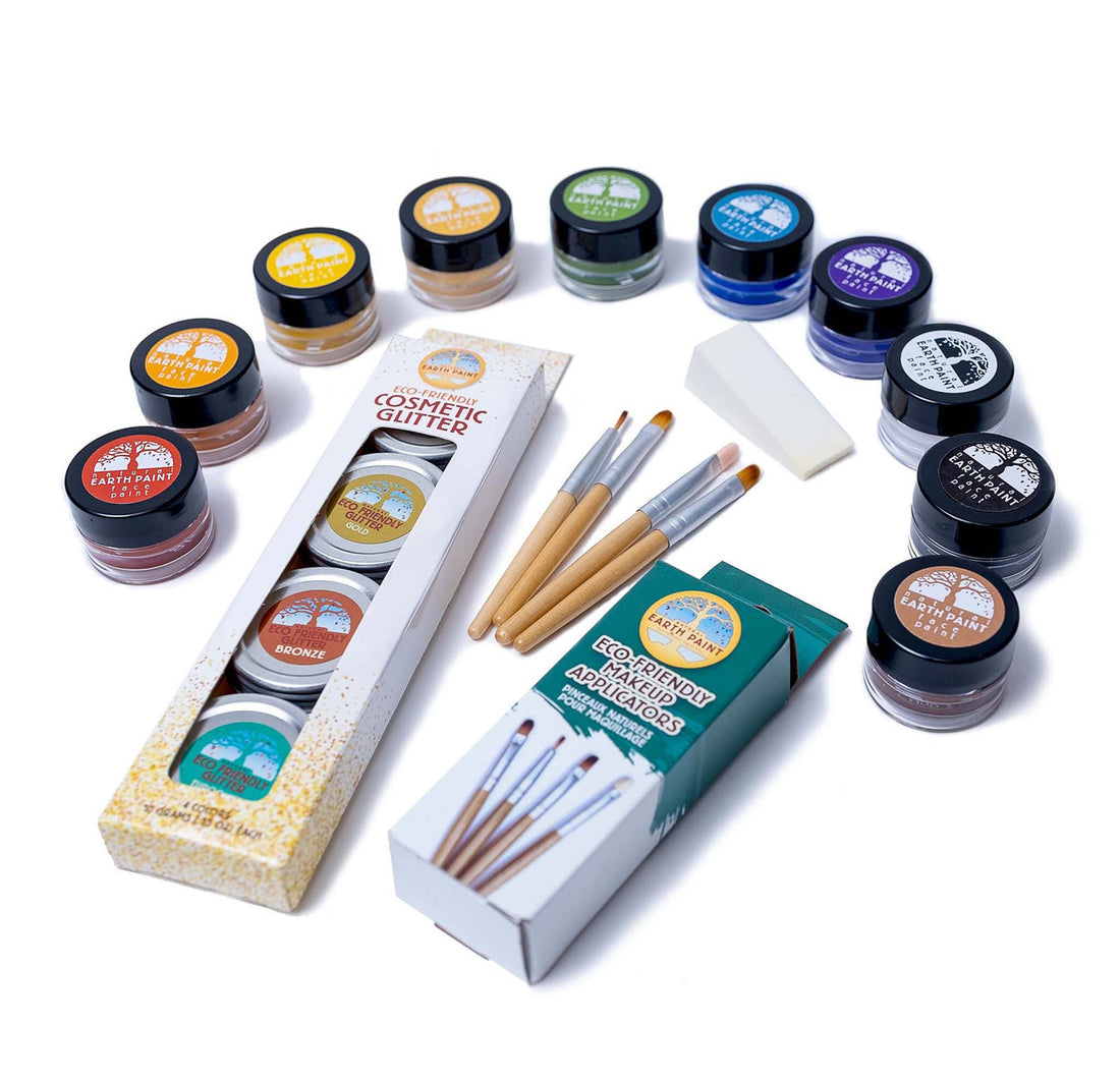 Components of the Deluxe Natural Face Paint & Eco Glitter Set including ten colors of face paint, four colors of glitter, four makeup applicators and a makeup sponge