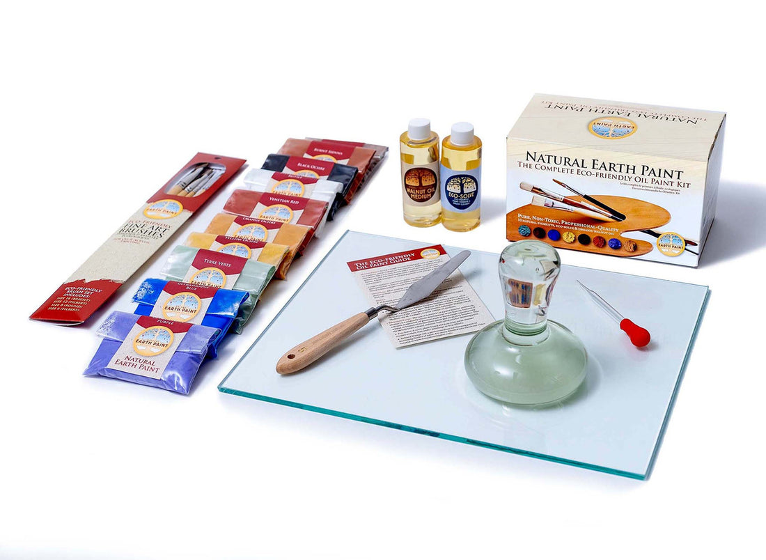 Components of the Deluxe Natural Oil Paint Mixing Set including glass palette, palette knife, glass muller, glass dropper, four fine art brushes and the Eco-Friendly Oil Paint Kit including ten pigment packets, walnut oil, eco-solve and instruction booklet