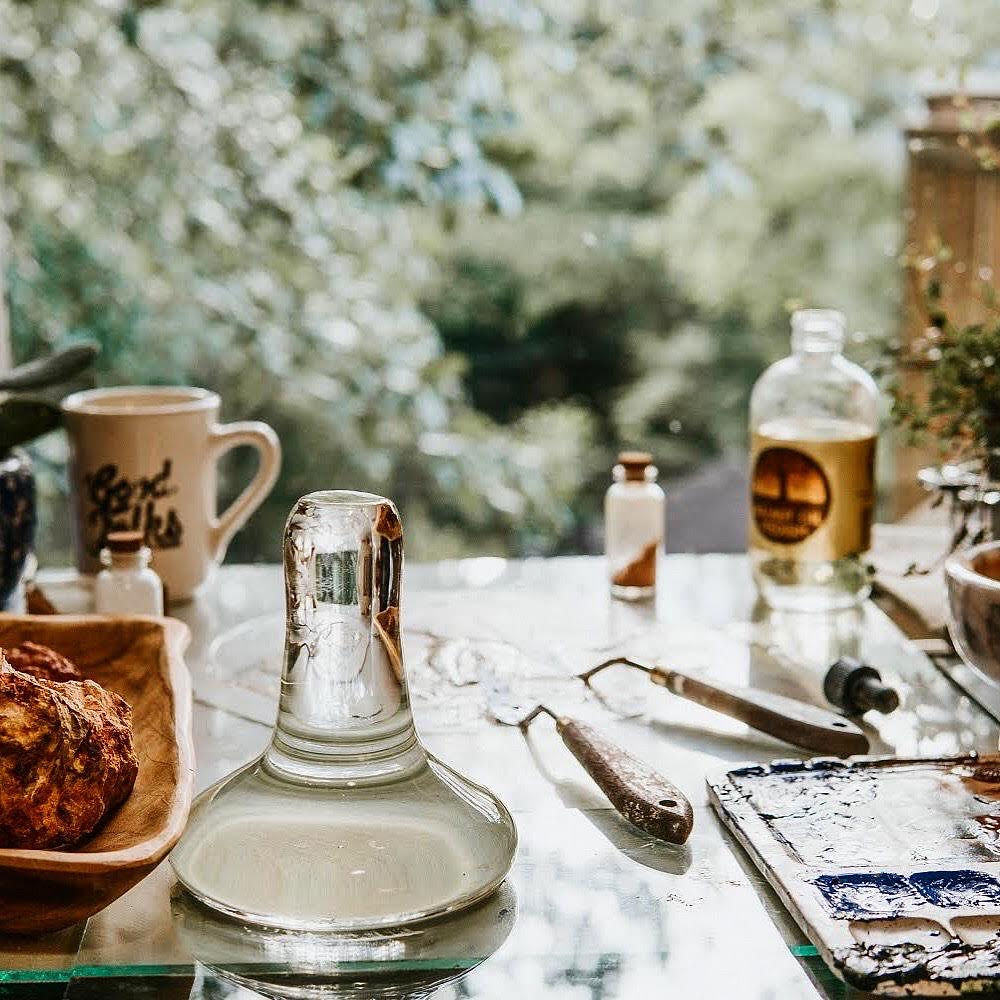 set up of oil paint mixing with  muller pallet knife oil and paints