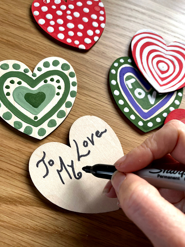 wooden hearts painted for valentines day
