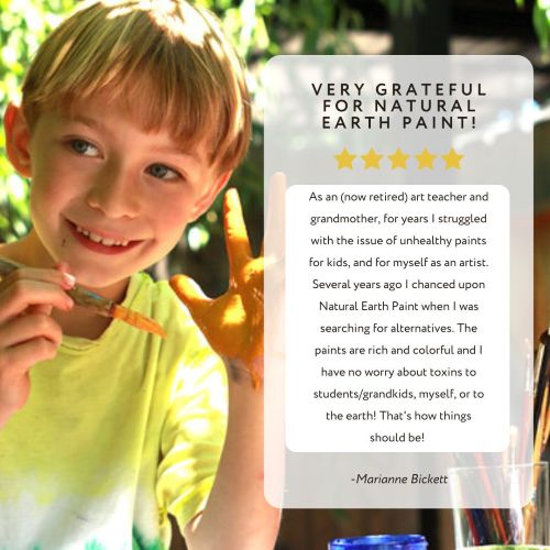 written review and child smiling with orange paint on hand