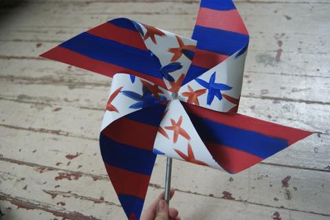 Red, white and blue painted Fourth of July pinwheel painted with Natural Earth Paint