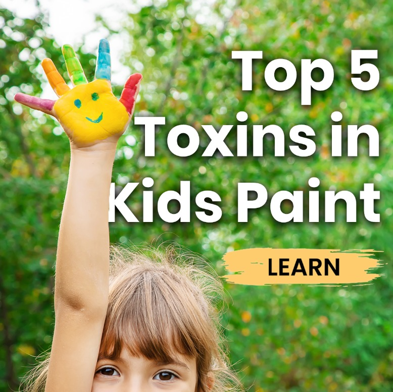 Child holding up their hand in the air that is painted with multiple colors and a smiley face on the palm in yellow and green with the words "Top 5 Toxins in Kids Paint" next to it