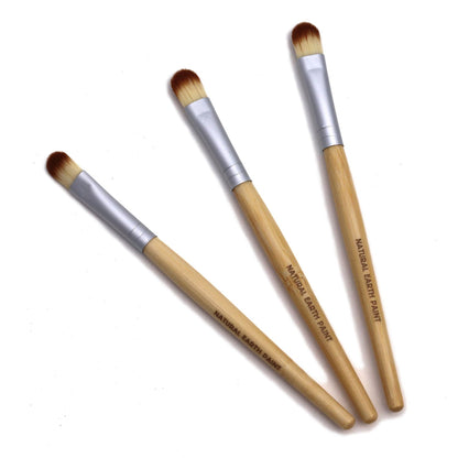 3 small bamboo paint brushes on a white background