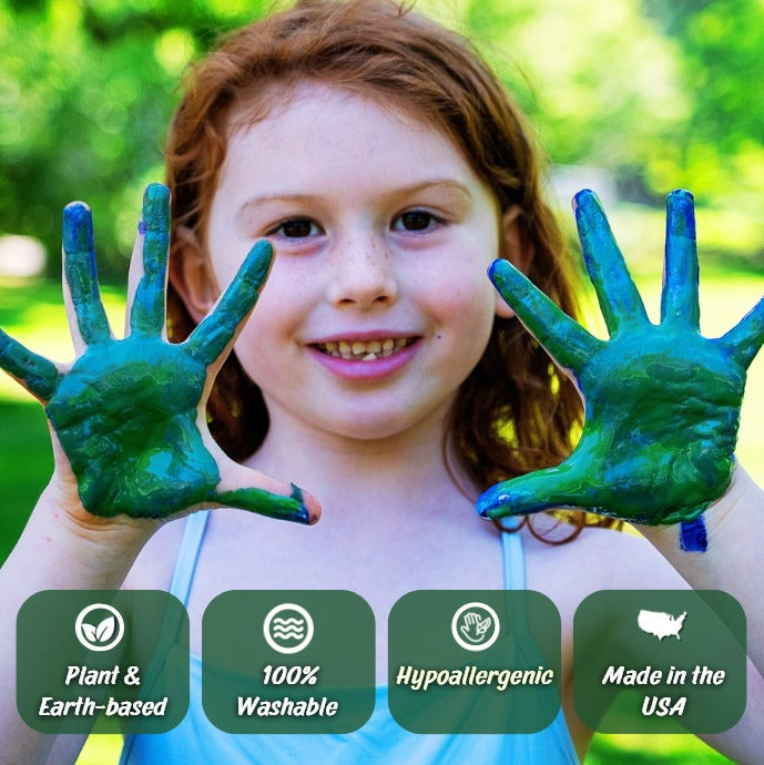 child with paint covered hands