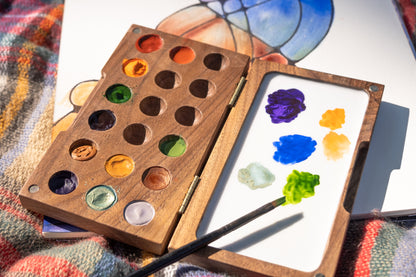 wooden paint pallet with watercolor